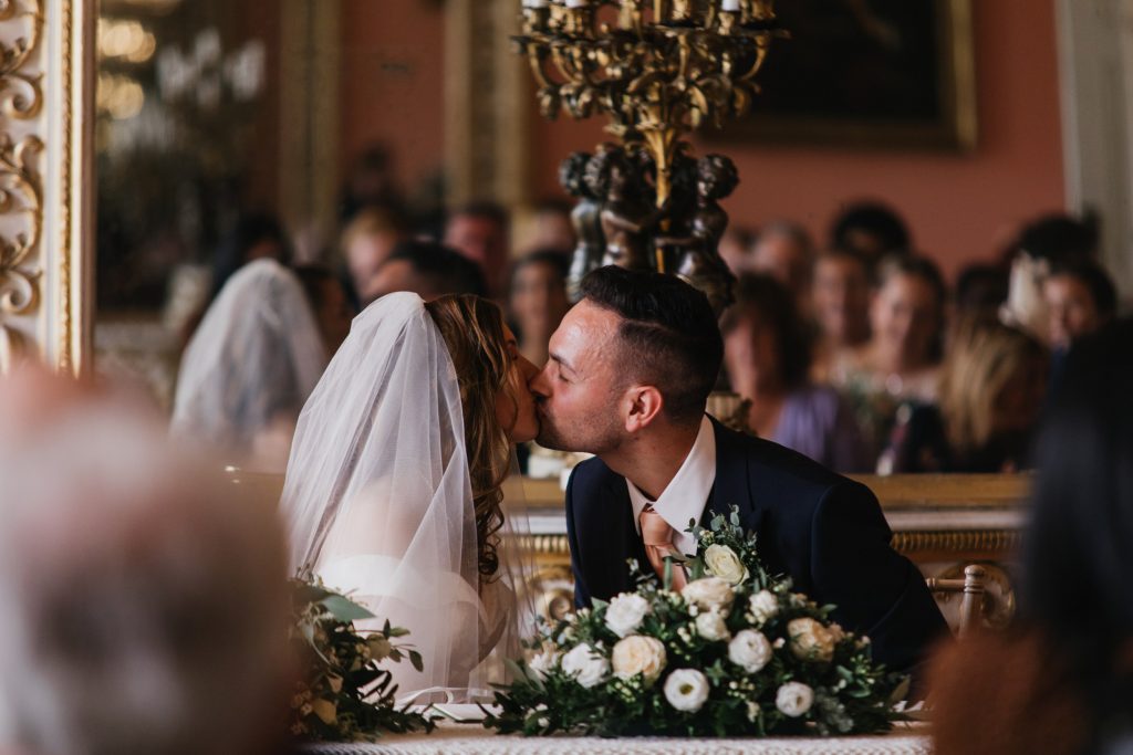 bridal couple kissing