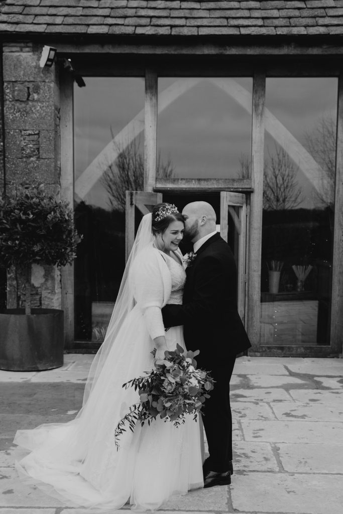 laughing wedding couple