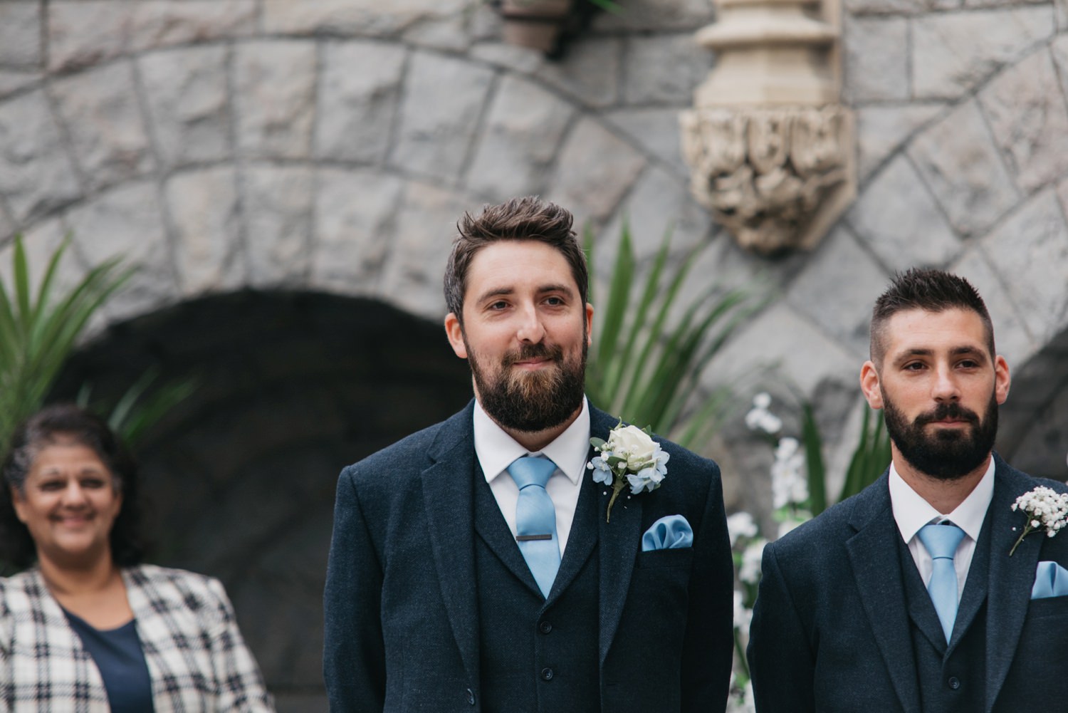 groom looking at bride