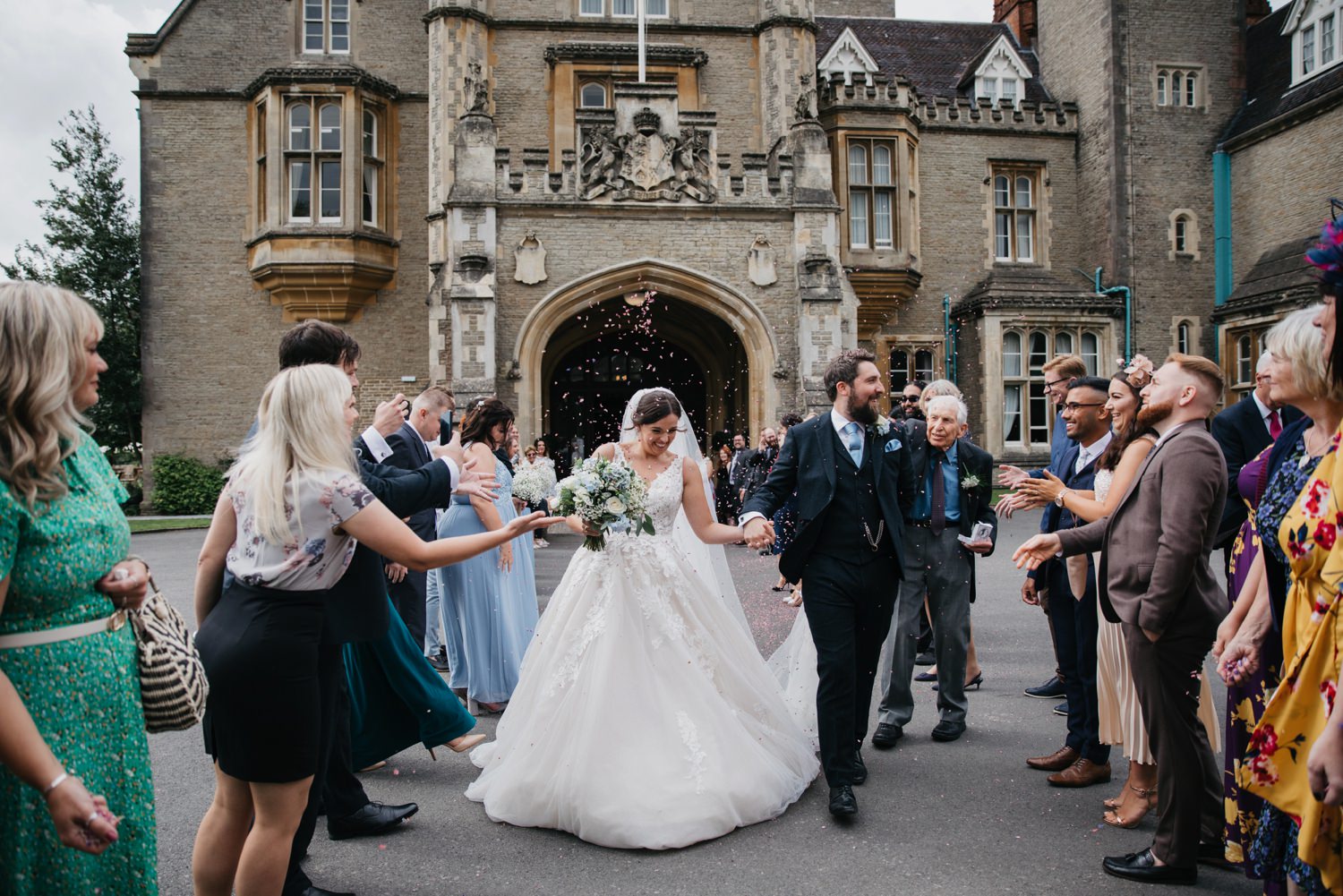 laughing wedding couple
