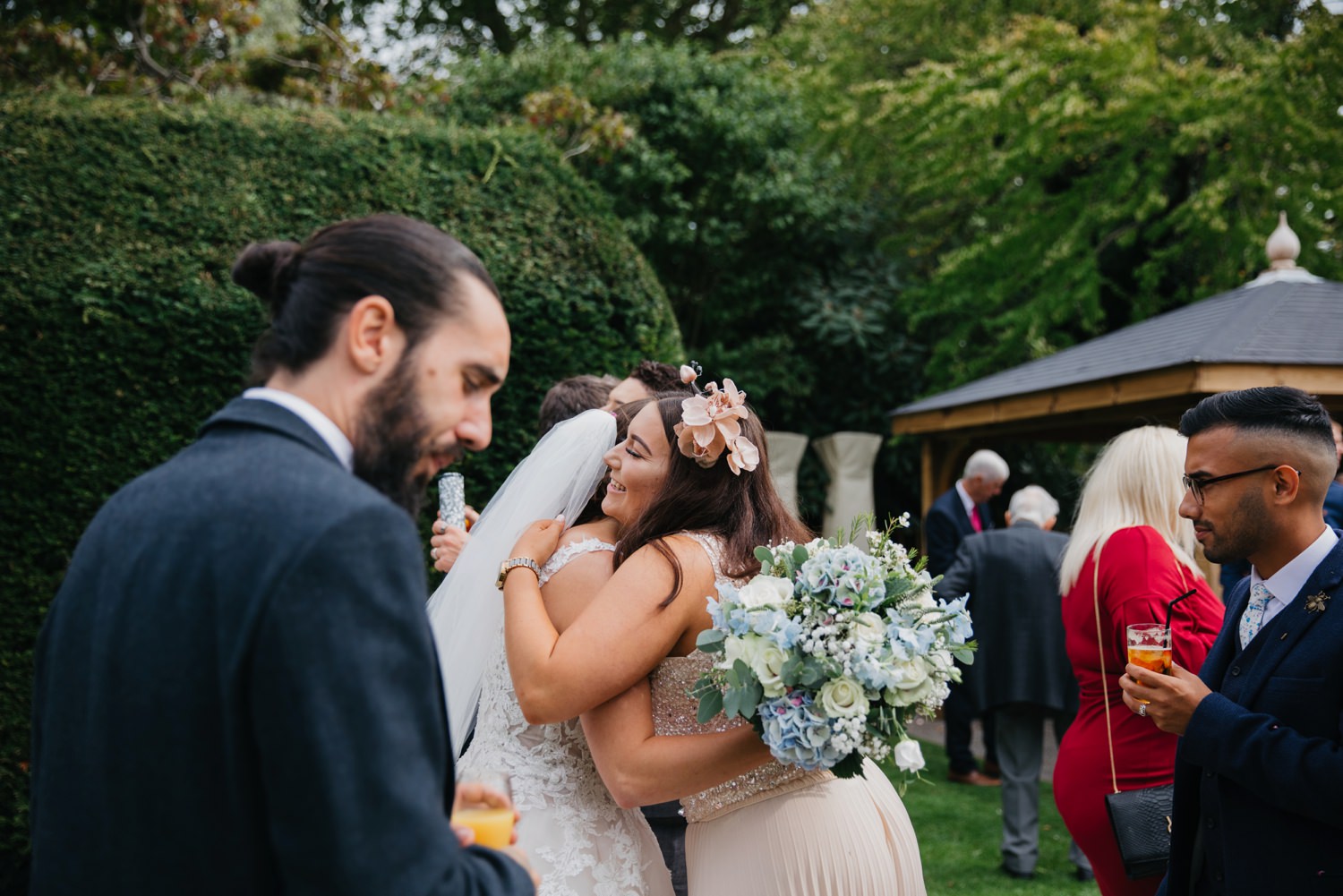 bride hugging guest