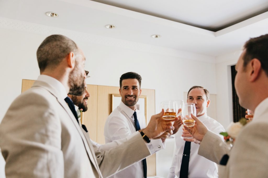 groomsmen drinking