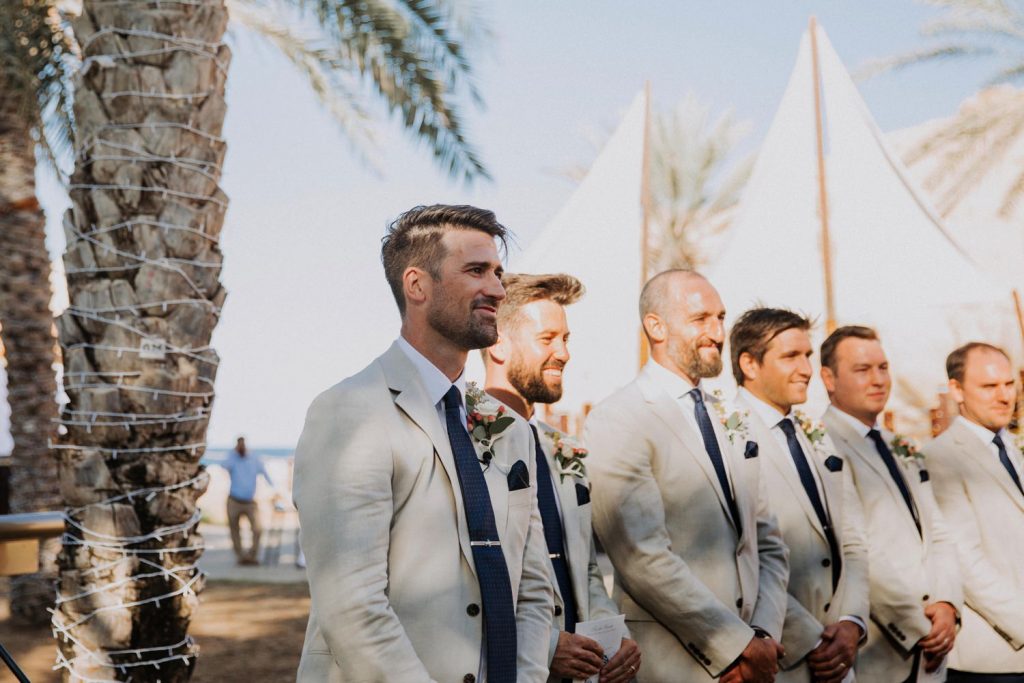 groom at aisle