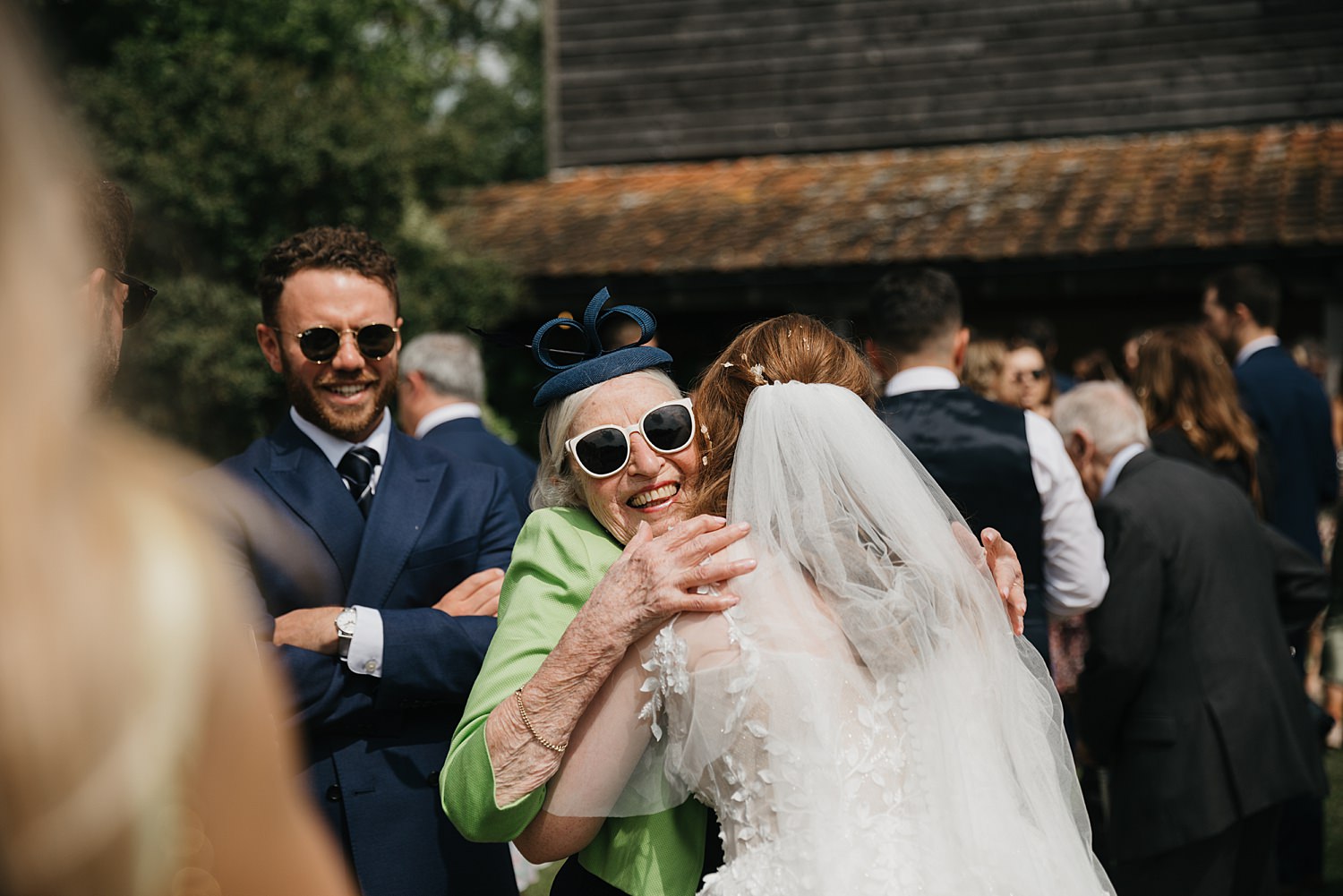 grandma hugging bride