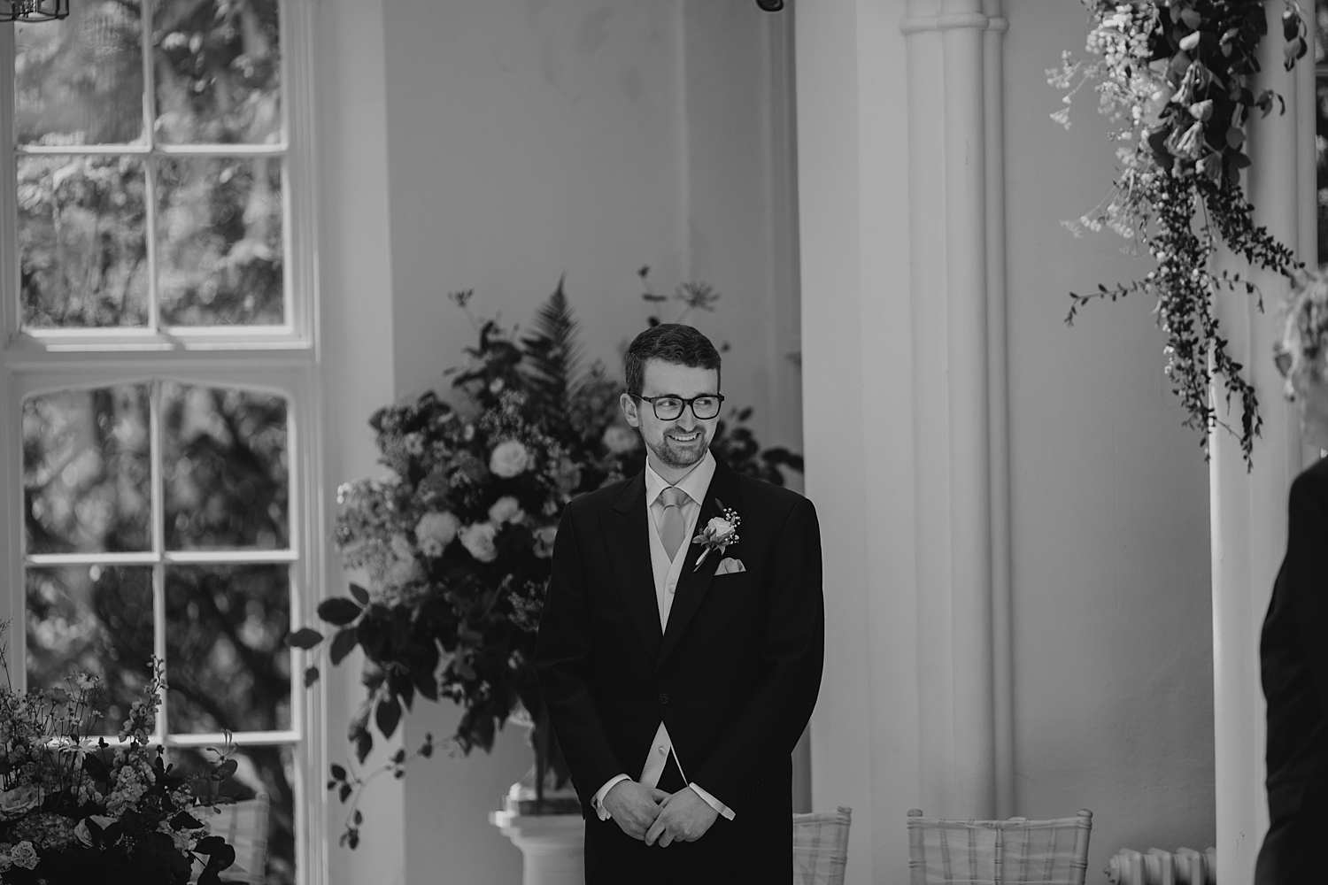 groom watching bride