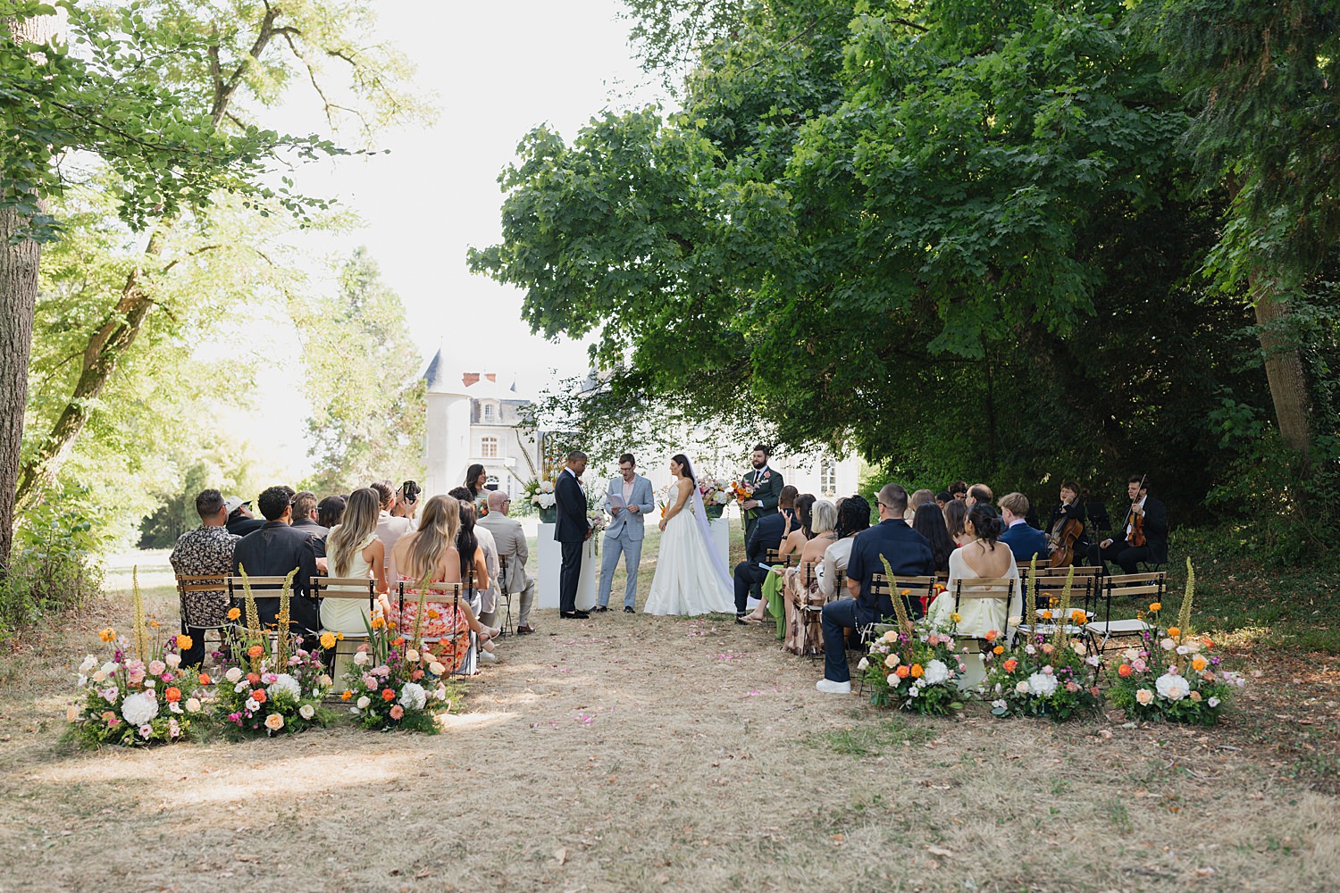 Outdoor ceremony at Château de Thauvenay wedding in Sancerre France