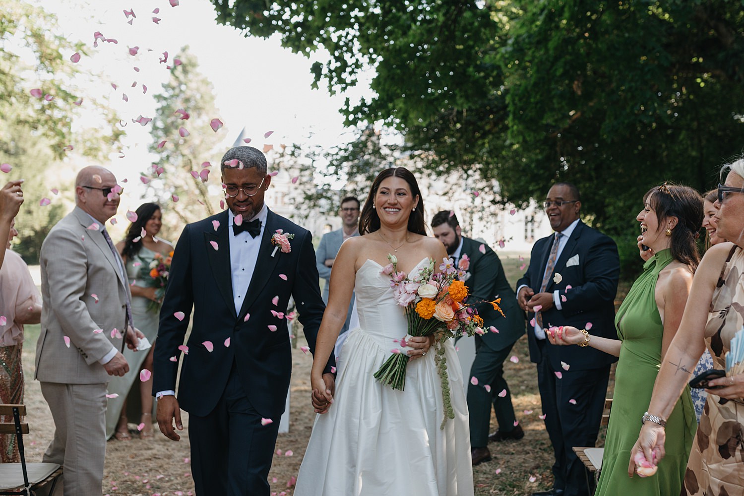 confetti down the aisle at a French countryside château wedding