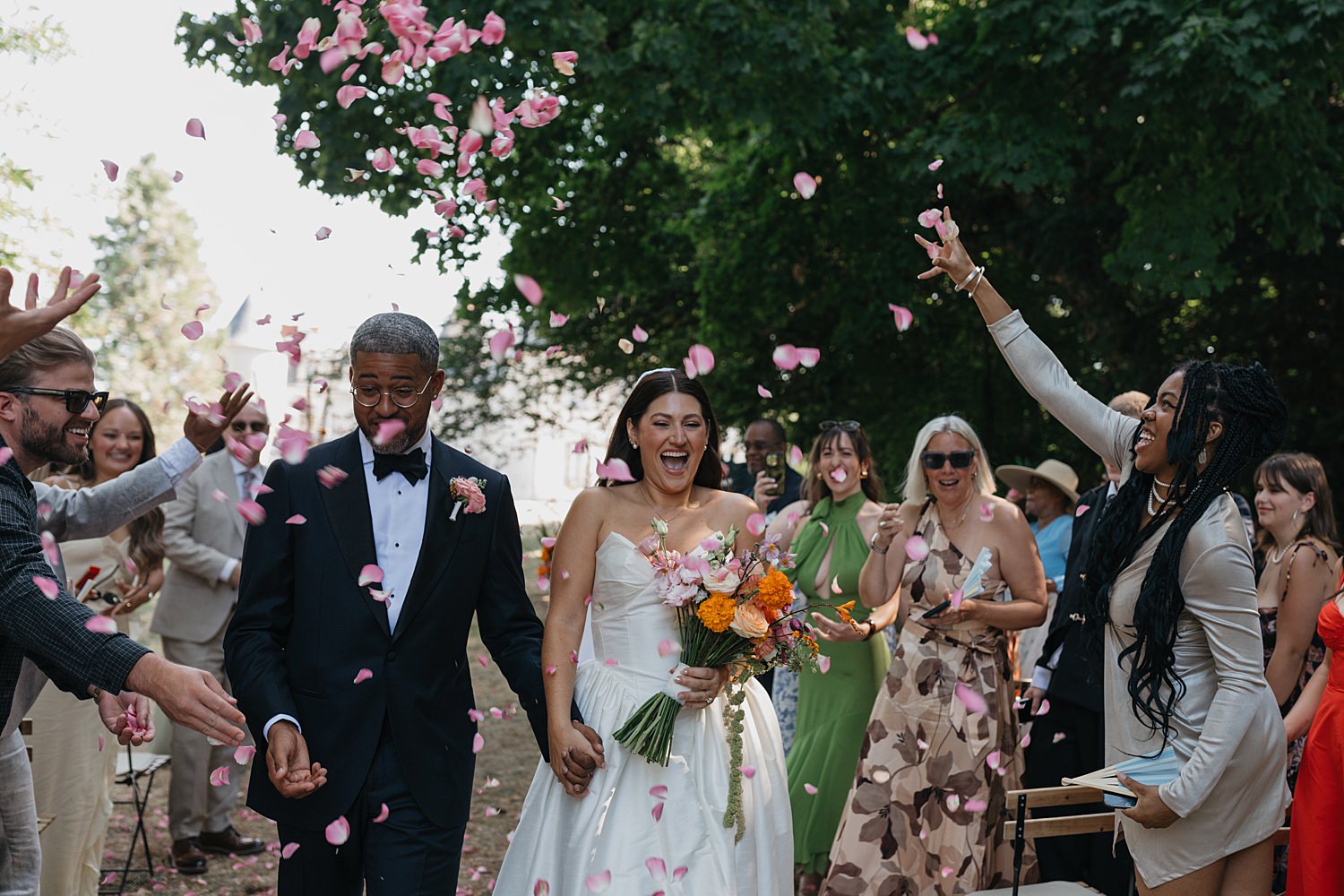 confetti down the aisle at a French countryside château wedding