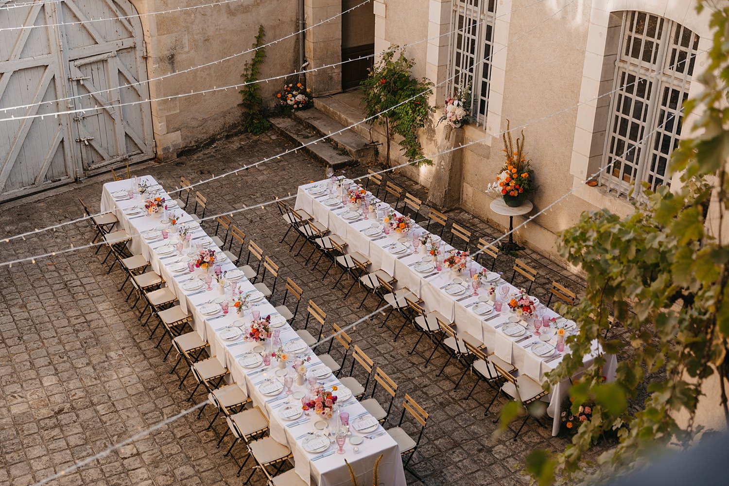 Wedding breakfast in the courtyard at Château de Thauvenay